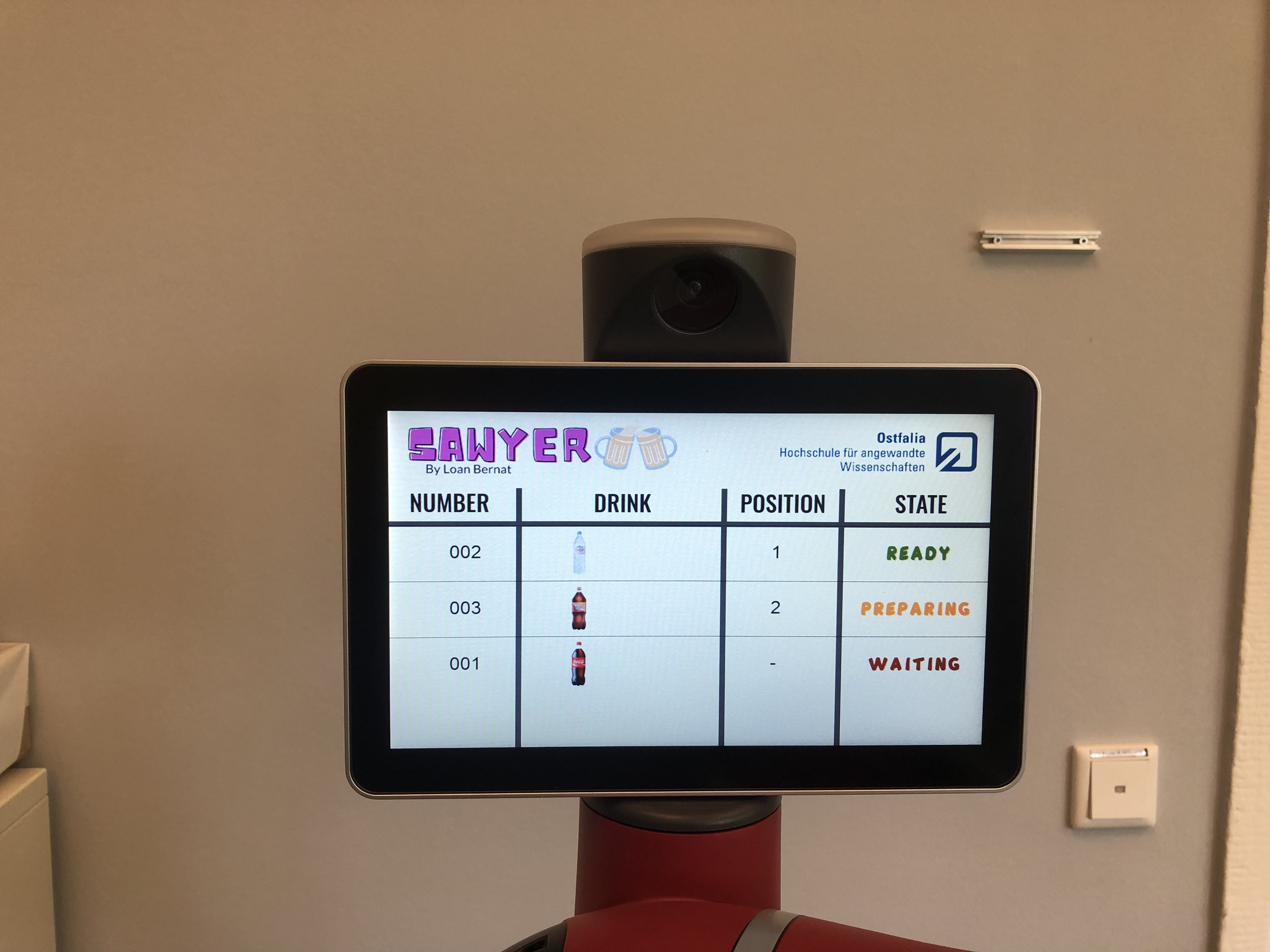 Sawyer display showing drink order numbers, positions, and execution states